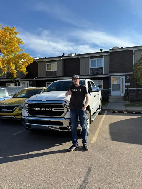 A Shift Happens Auto Sales customer with their vehicle on handover day