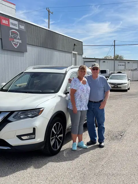 A Shift Happens Auto Sales customer with their vehicle on handover day