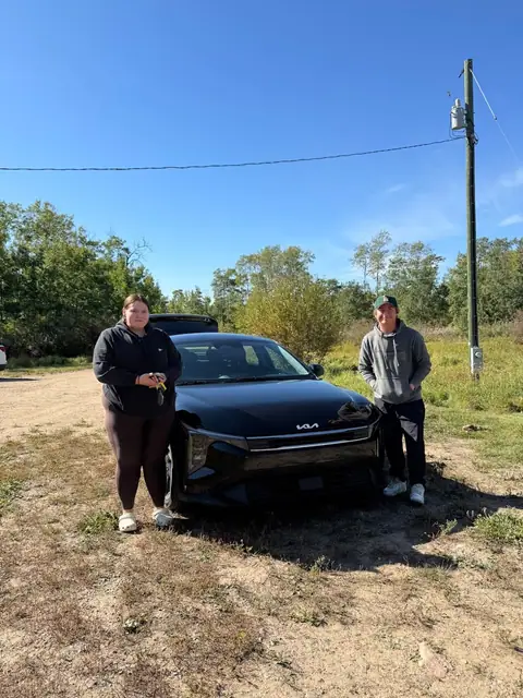 A Shift Happens Auto Sales customer with their vehicle on handover day